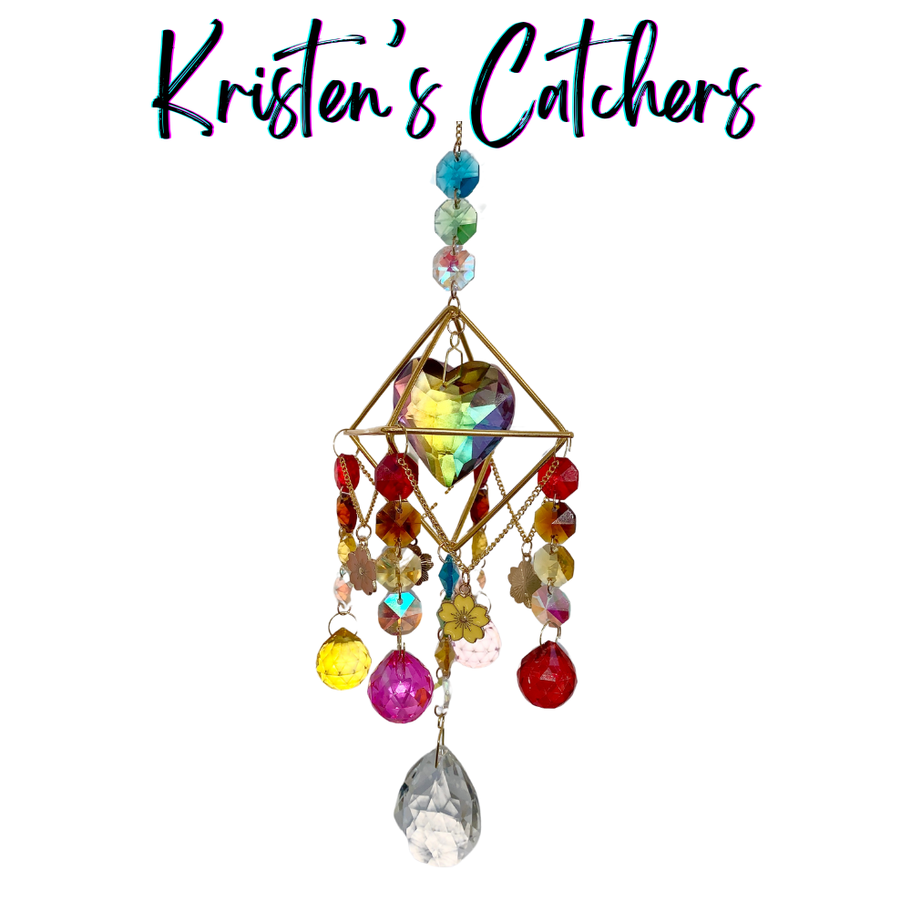 Flower Child sun catcher with colorful crystals, flower charms and a gold geometric frame