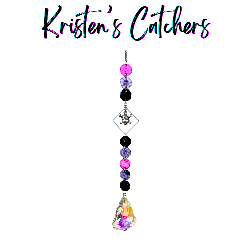 Goth Core sun catcher with pink, purple, and black crystals, skull and bones charm 